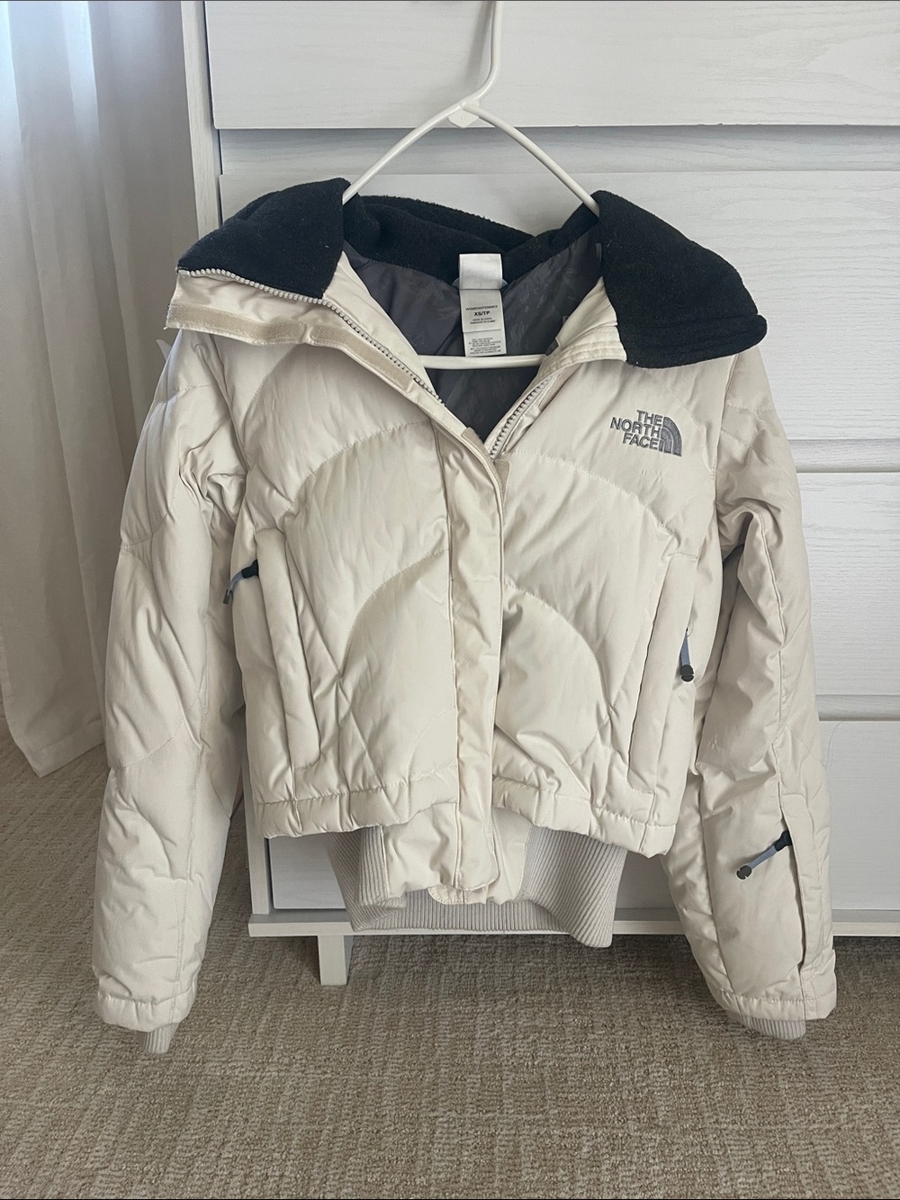 The North Face Off-White Puff Jacket with Black Hood